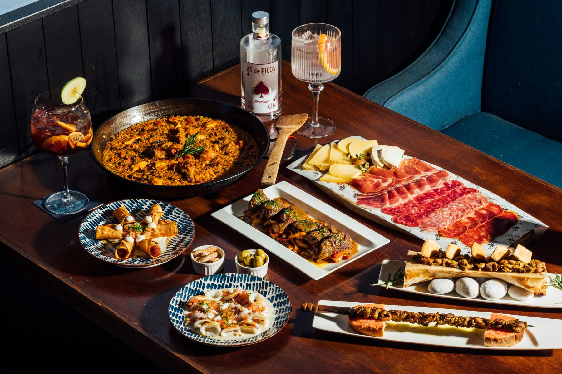 Spanish tapas and paella on a table